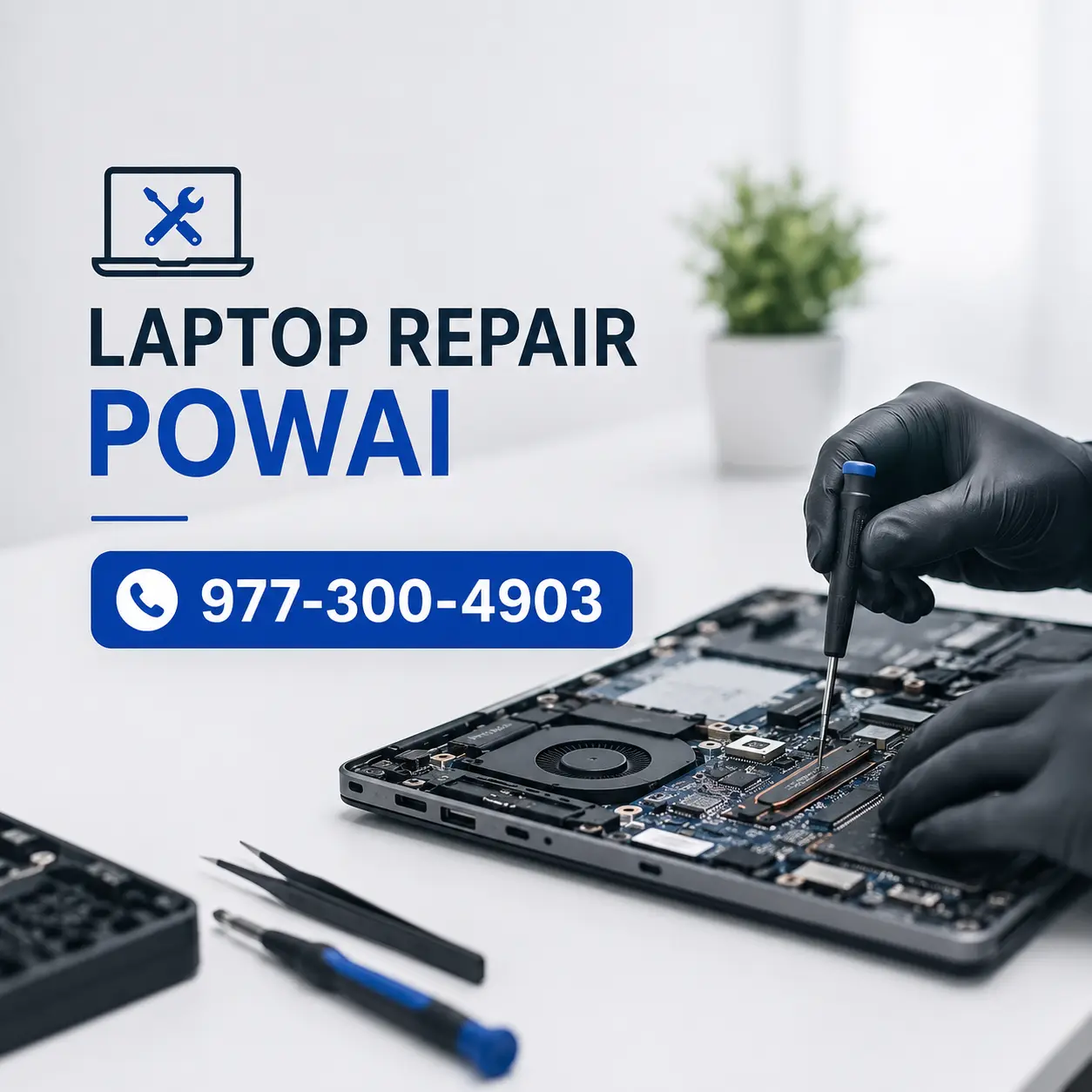 Laptop repair technician servicing a Dell laptop motherboard in Powai